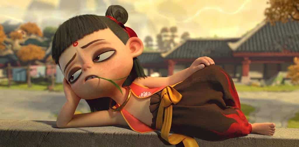 Young Ne Zha lounging on a wall with a playful, mischievous expression in the 2019 animated movie Ne Zha.